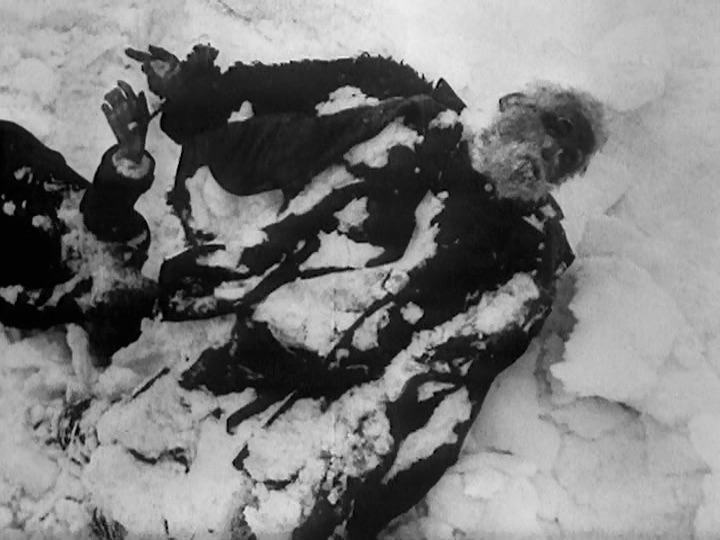 This event poster shows a film still depicting a dead body lying in the snow.