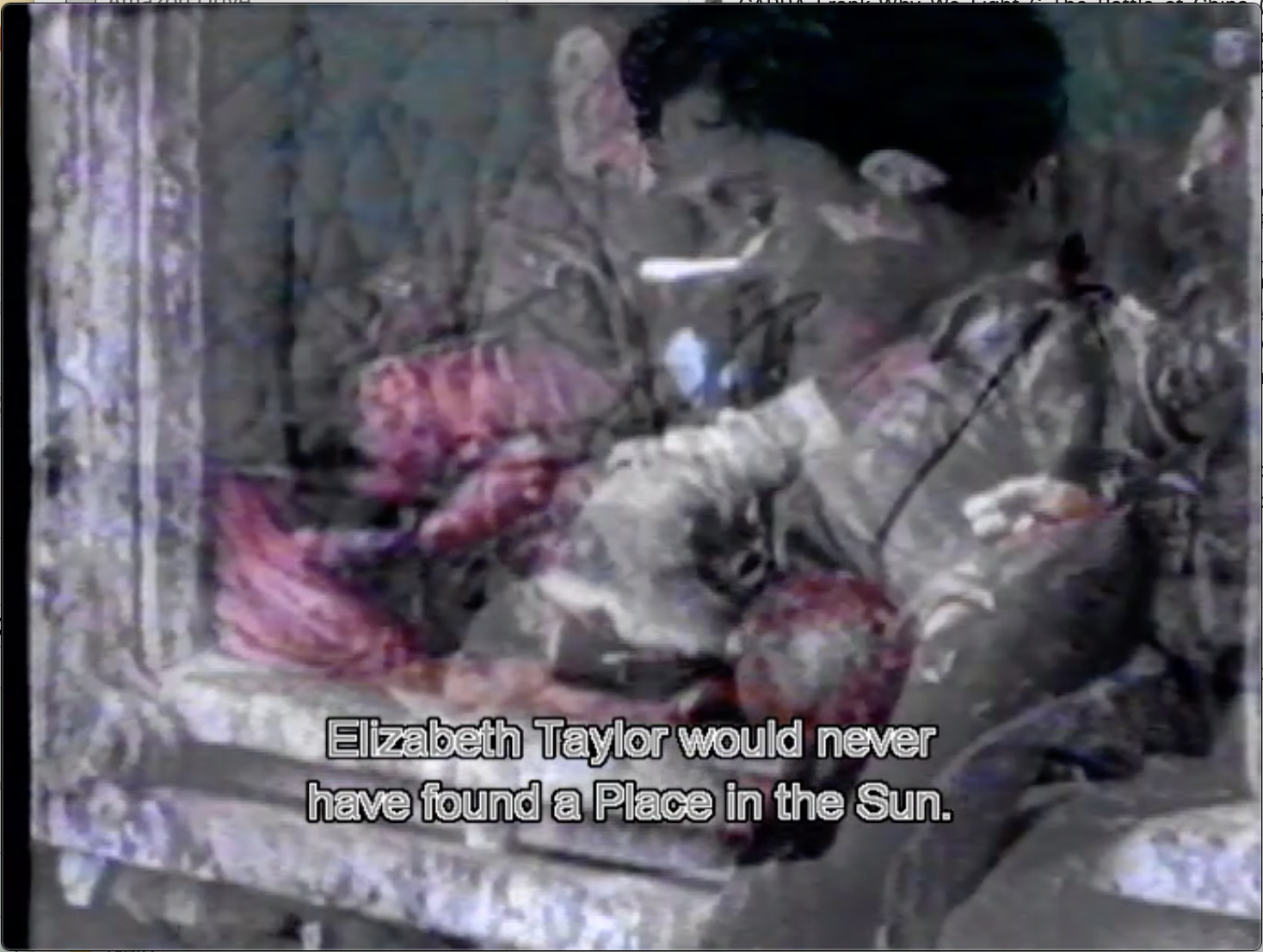 The image shows a still taken from Jean-Luc Godard’s film Histoire(s) du cinema. The subtitle reads “Elizabeth Taylor would never have found a Place in the Sun.