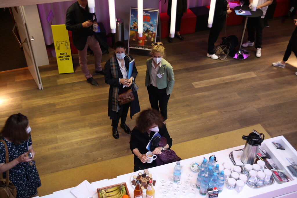 This photo shows participants of the conference during a coffee break.