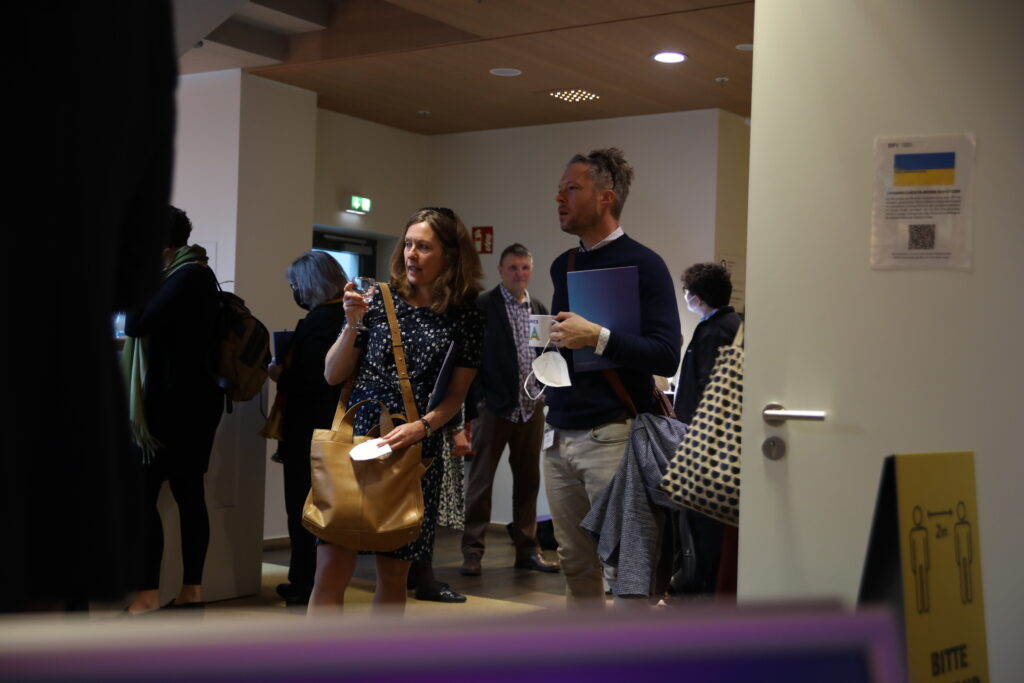 This photo shows participants of the conference during a coffee break.
